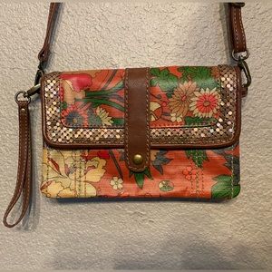 The Sak roots messenger/wristlet